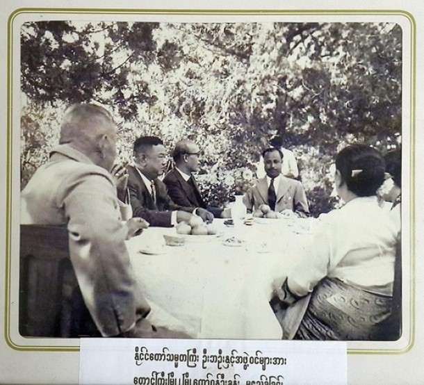 Mayor U Khan sits at the head of the table next to Burma’s President U Ba Oo.