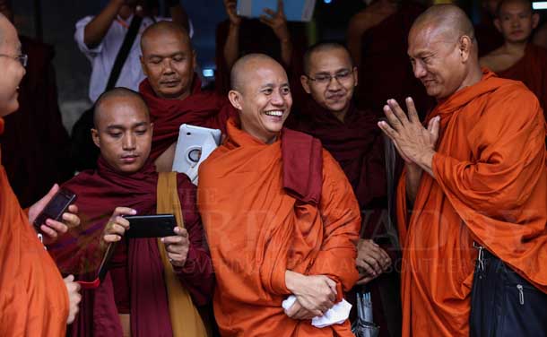 Nationalist Buddhist monk U Wirathu is greeted with respect at a monks' conference in Rangoon in June 2013. (Photo: The Irrawaddy).