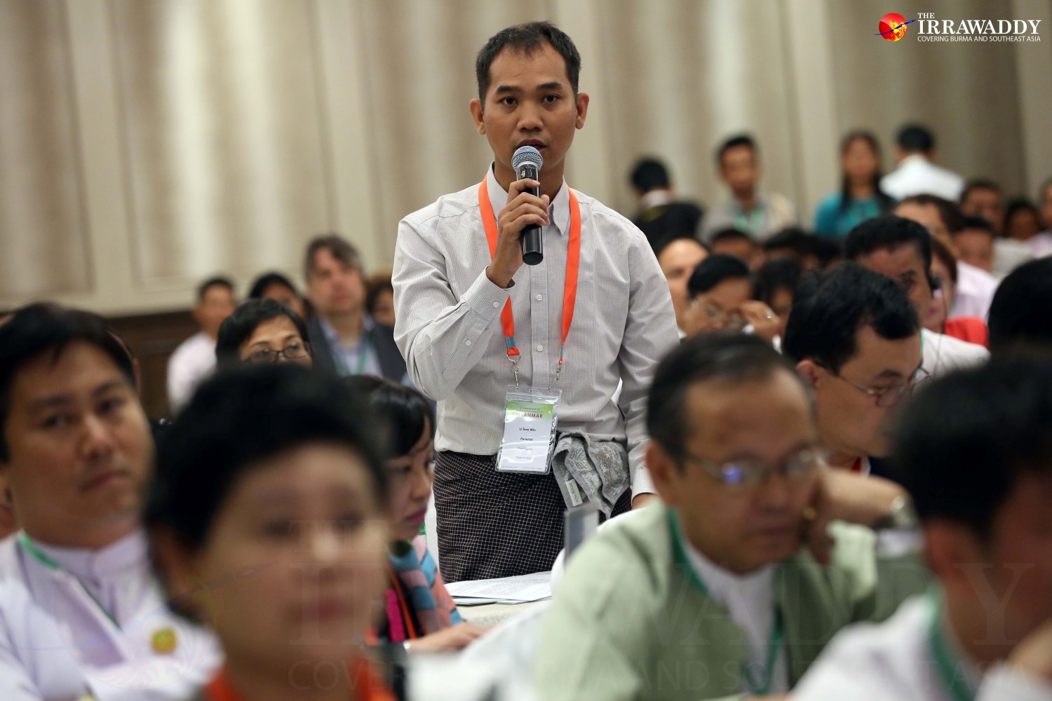 U Swe Win, chief correspondent from Myanmar Now news media outlet, asks a question at the fifth media development conference in Rangoon on Monday. 