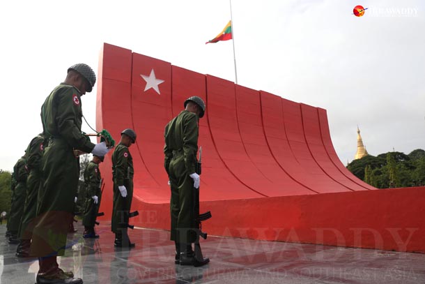 An honor guard pays respect to Gen Aung San and his colleagues at the mausoleum on July 19, 2015. (Photo: Hein Htet / The Irrawaddy)