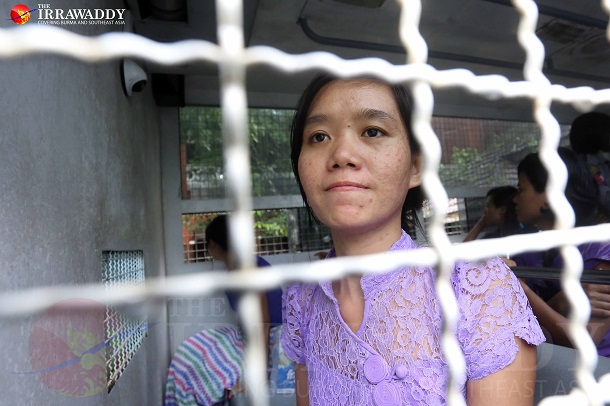 Phyoe Phyoe Aung, general secretary of the All Burma Federation of Student Unions, inside a police detention vehicle before a court hearing in Tharawaddy. (Photo: JPaing / The Irrawaddy)
