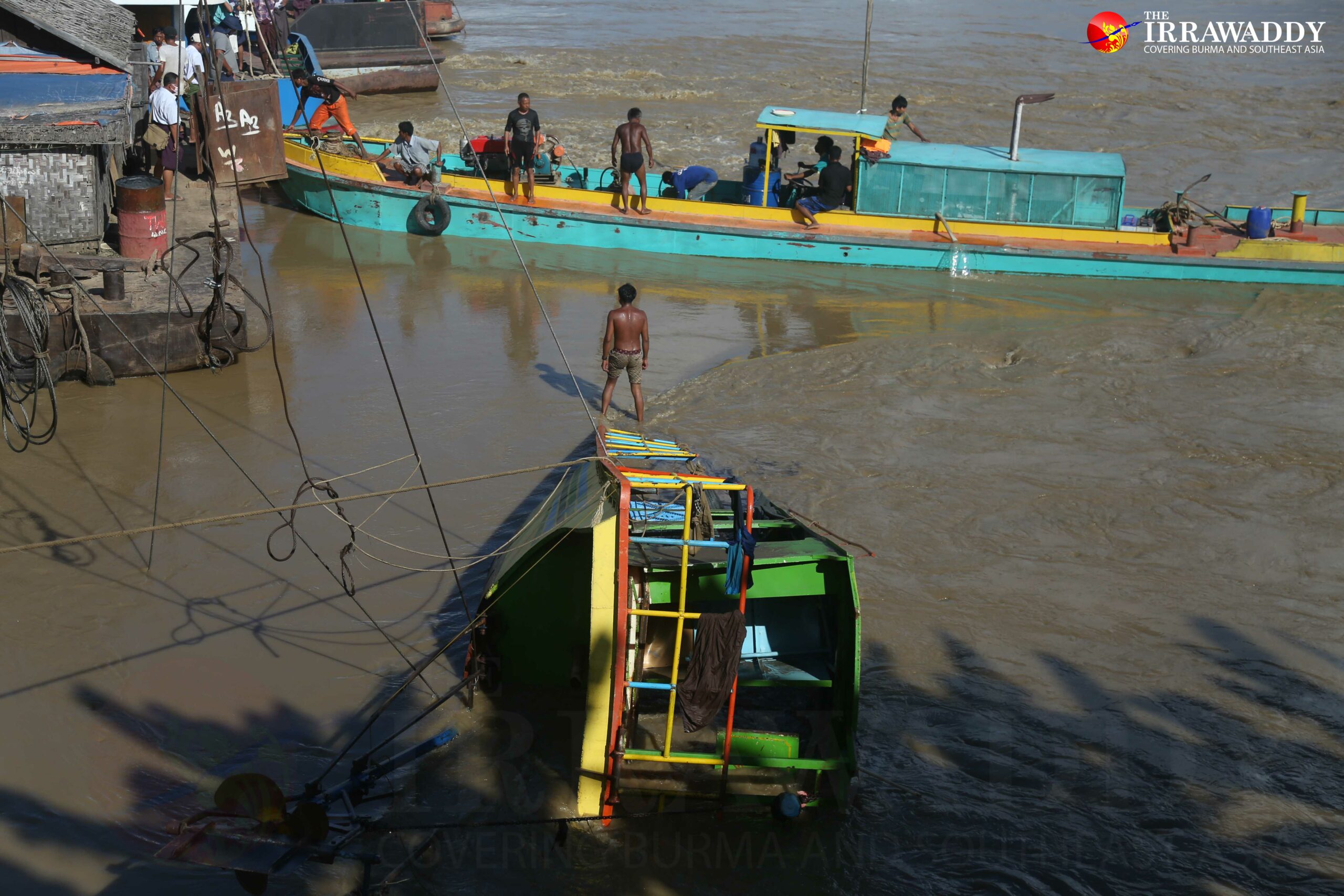 A rescue team tries to salvage a ferry that capsized, and killed at least 40, on the Chindwin River in Sagaing Division’s Kani Township. (Photo: Pyay Kyaw/ The Irrawaddy)