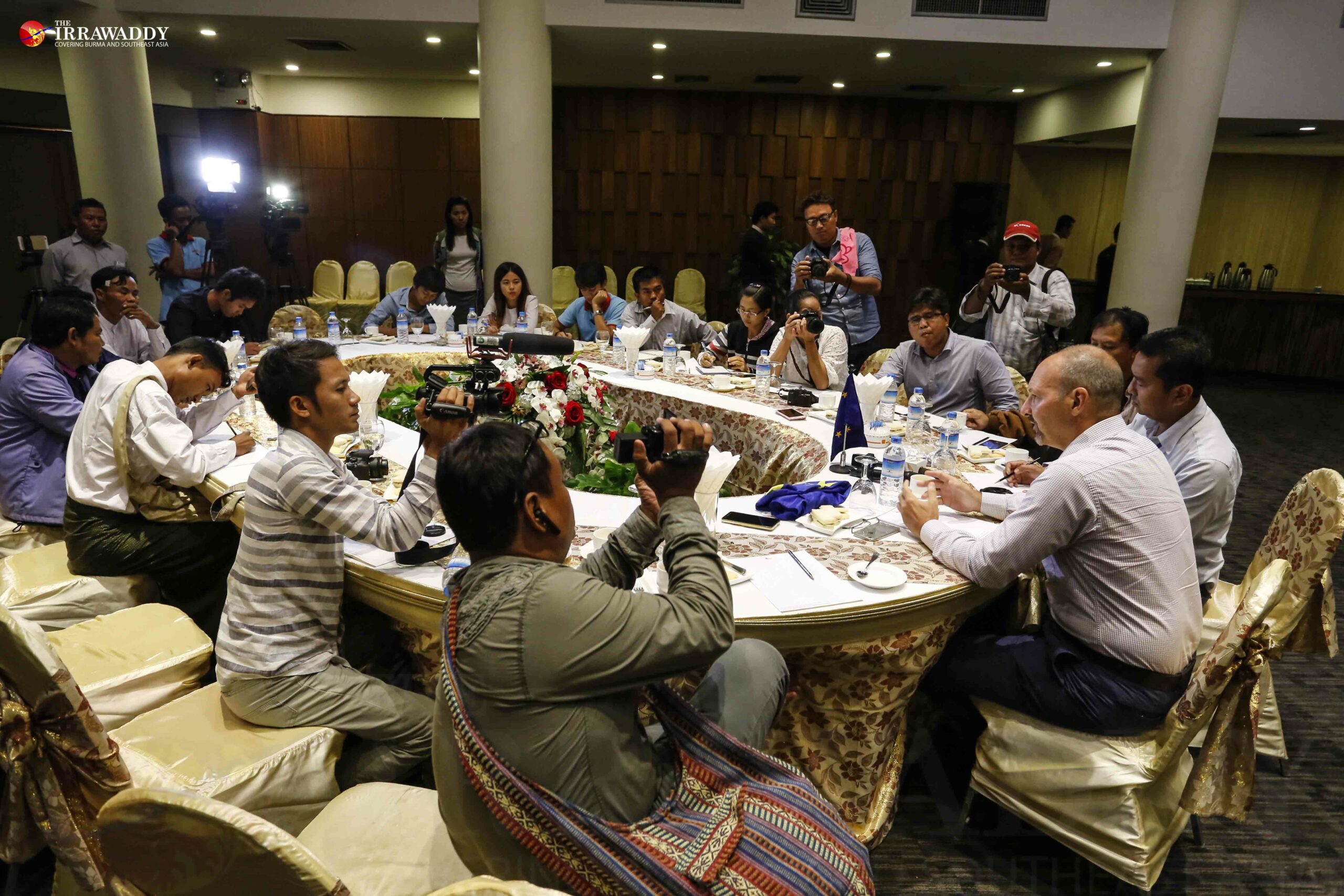 Roland Kobia speaks to journalists in Mandalay on August 23.